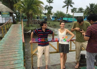 Sundarban Tour- Guest fixing camera to click