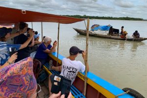 Guest capturing moments in barishal floating market tour