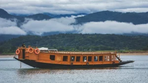 Luxury premium houseboat of Deshghuri floating on the crystal sapphire waters of Tanguar Haor Sunamganj 2026